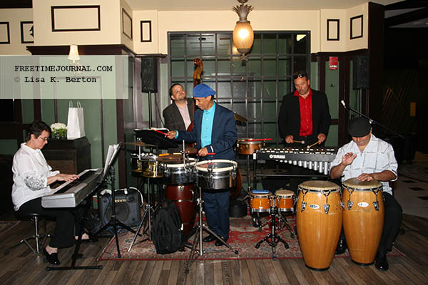 Latin jazz musicians performing in a lounge