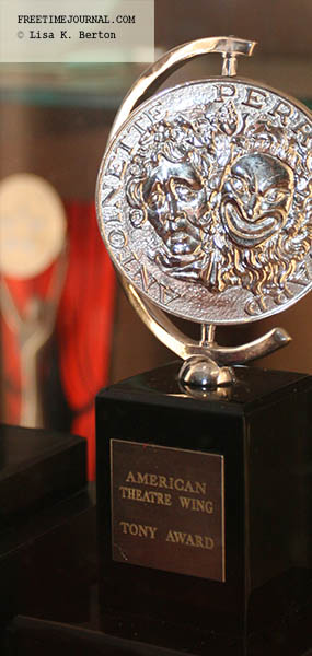 Circular silver theater award